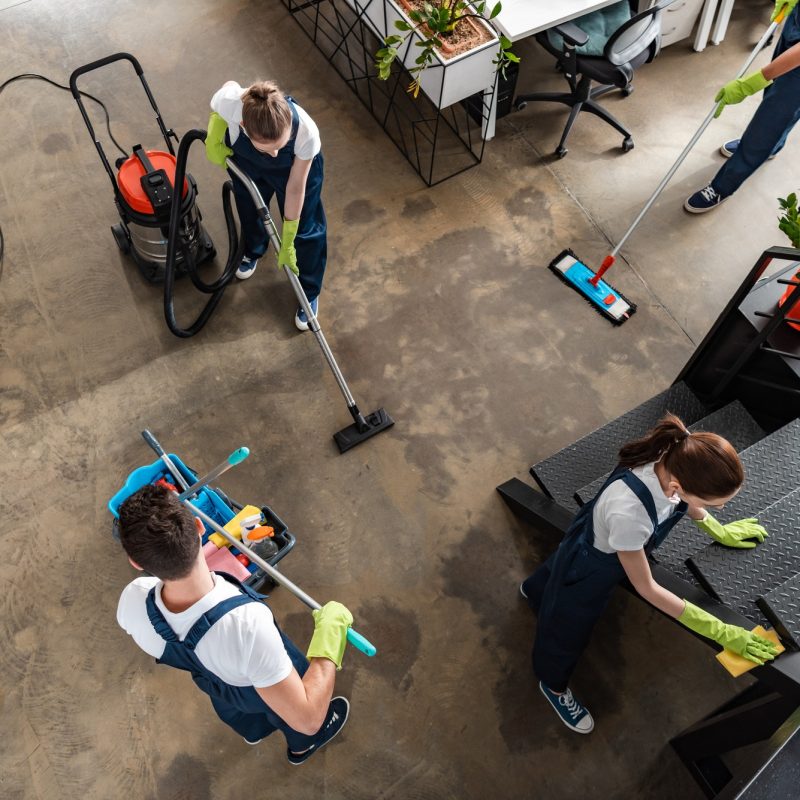 top-view-of-cleaning-company-team-cleaning-modern-office.